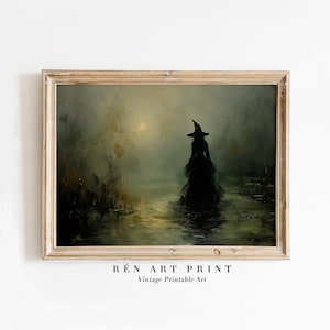 May include: A framed vintage print featuring a silhouetted witch in a long dress and hat, standing in a misty swamp. The artwork has a muted color palette with a gold-toned frame. The text "R&Eacute;n ART PRINT Vintage Printable Art" is at the bottom.