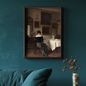 May include: A painting of a woman in a black dress sitting at a table in a room with a white tablecloth and a vase of flowers. The room is decorated with framed artwork and mirrors.
