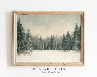 May include: A vintage painting of a snowy forest scene with tall pine trees in the foreground and a light blue sky in the background. The painting is framed in a light wood frame.