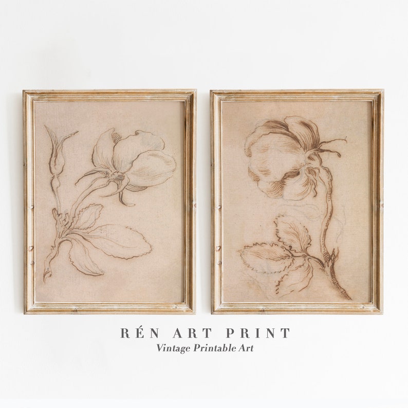 May include: Two vintage botanical prints in beige frames, each featuring a detailed line drawing of a rose with leaves on a beige background. The text "R&Eacute;N ART PRINT Vintage Printable Art" is below the frames.