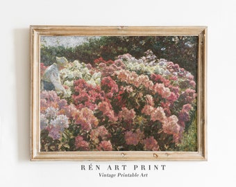 May include: A vintage painting of a garden with pink and white flowers. The painting is framed in a light wood frame.