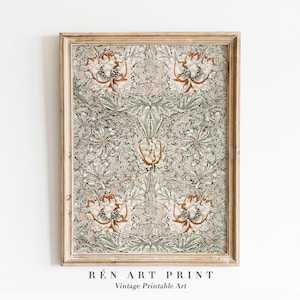 May include: A framed vintage print of a floral pattern in shades of green, brown, and white. The print features a repeating design of stylized flowers and leaves. The frame is a light wood color.