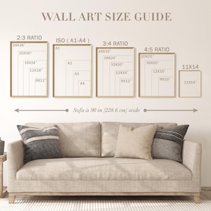 May include: A wall art size guide chart displaying various frame dimensions in inches, including 2:3, 3:4, 4:5 ratios, ISO A1-A4, and 11x14 sizes. Below, a beige sofa is shown with a text label indicating a width of 90 inches (228.6 cm).