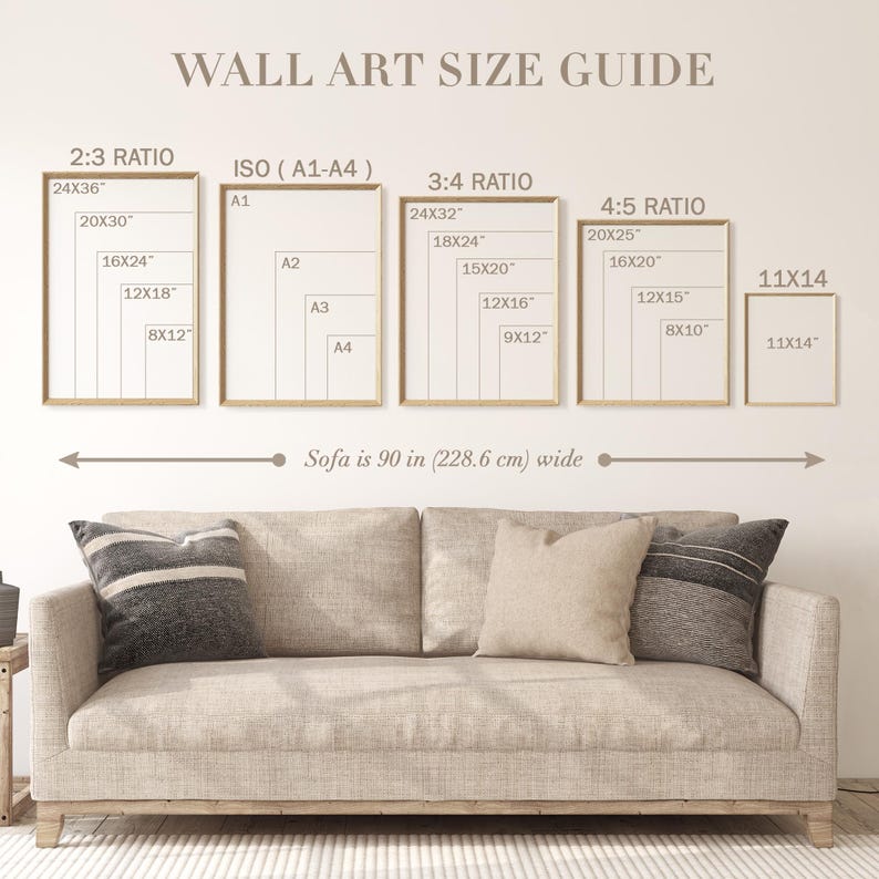 May include: A wall art size guide chart displaying various frame dimensions in inches, including 2:3, 3:4, 4:5 ratios, ISO A1-A4, and 11x14 sizes. Below, a beige sofa is shown with a text label indicating a width of 90 inches (228.6 cm).