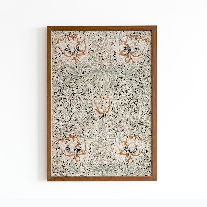 May include: A framed print of a floral pattern with a repeating design of stylized flowers and leaves in shades of brown, green, and white.