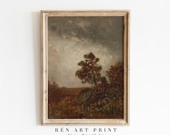 May include: A vintage landscape painting in a wooden frame. The painting depicts a lone tree in a field with a cloudy sky in the background.