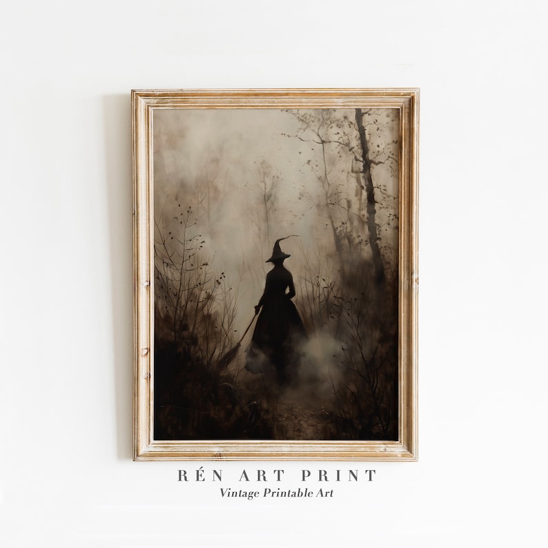 May include: A framed vintage art print shows a silhouetted witch in a dark forest, sweeping with a broom. The artwork is in shades of grey and brown, with a misty, atmospheric quality. The text "R&Eacute;n ART PRINT Vintage Printable Art" is at the bottom.