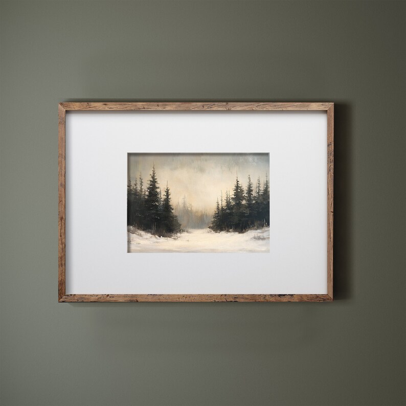 May include: A framed painting of a snowy forest scene with tall evergreen trees in the background. The trees are silhouetted against a hazy, light blue sky. The foreground is covered in snow.