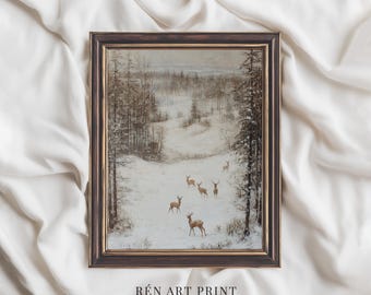 May include: A framed winter landscape print featuring a snowy forest scene with several deer. The artwork has a dark brown frame and the text "RÉN ART PRINT" at the bottom. The overall color palette is muted with shades of brown, white, and gray.