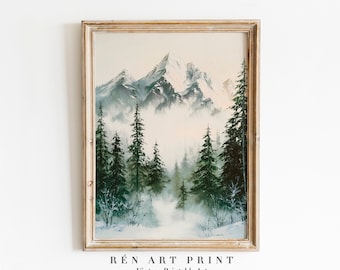 May include: A framed vintage art print depicts a snowy mountain landscape with evergreen trees. The painting features a misty atmosphere and a muted color palette of whites, greens, and grays. The text "RÉN ART PRINT Vintage Printable Art" is at the bottom.
