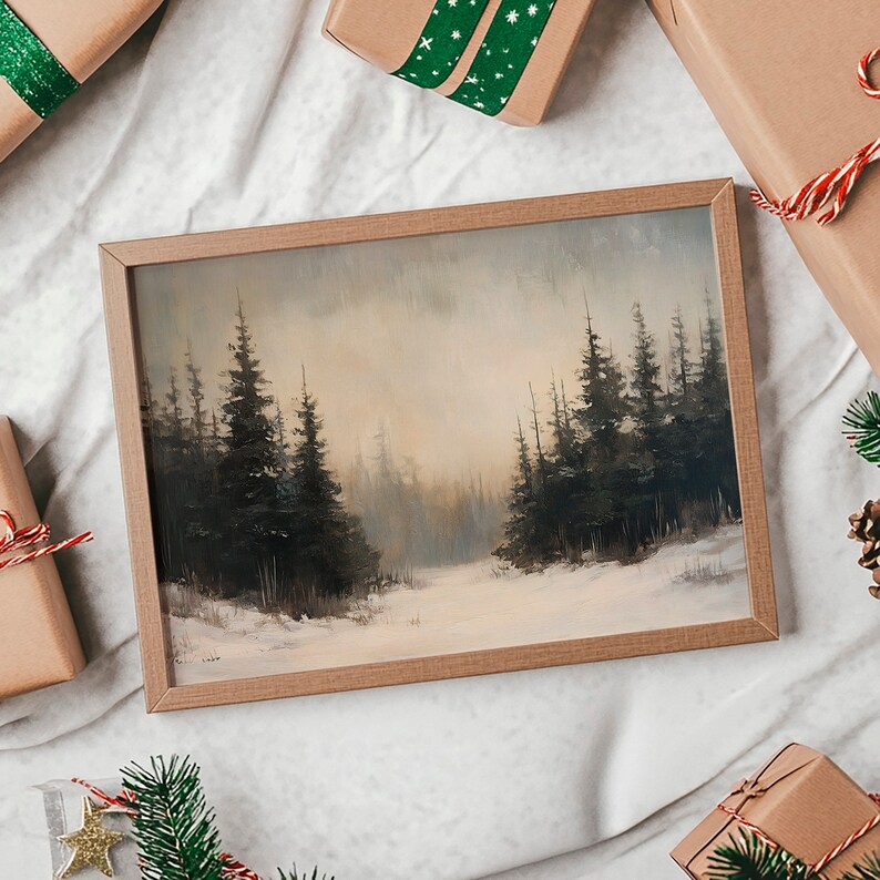 May include: A framed painting of a snowy forest scene with tall evergreen trees in the foreground and a hazy, light brown background.