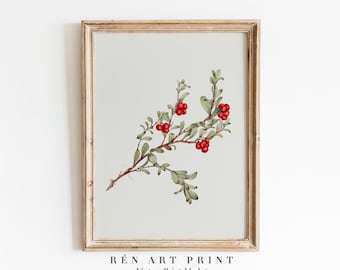 May include: A framed botanical print featuring a detailed illustration of a branch with red berries and green leaves. The artwork is set against a light gray background and framed in a gold-toned wooden frame. The text "RÉn ART PRINT Vintage Printable Art" is at the bottom.
