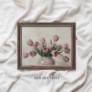 May include: A framed art print featuring a bouquet of pink tulips in a decorative vase. The artwork has a vintage aesthetic with a dark brown frame and the text "RÉN ART PRINT" at the bottom.