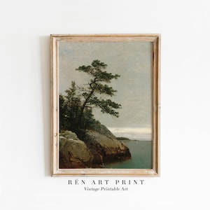 May include: A vintage painting depicting a rocky shoreline with a solitary pine tree on a cliff overlooking a stretch of water. The sky is overcast and the water is a pale blue.