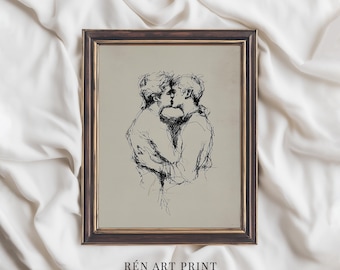 May include: A framed art print featuring a sketch of two people embracing and kissing. The artwork is in black and white, with the text "RÉN ART PRINT" at the bottom. The frame is dark brown, and the background is a neutral beige.