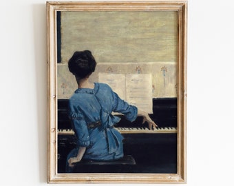 May include: Vintage art print of a woman playing a piano, wearing a blue dress. The artwork is framed in a gold-colored wooden frame. The text "RÉN ART PRINT Vintage Printable Art" is at the bottom.