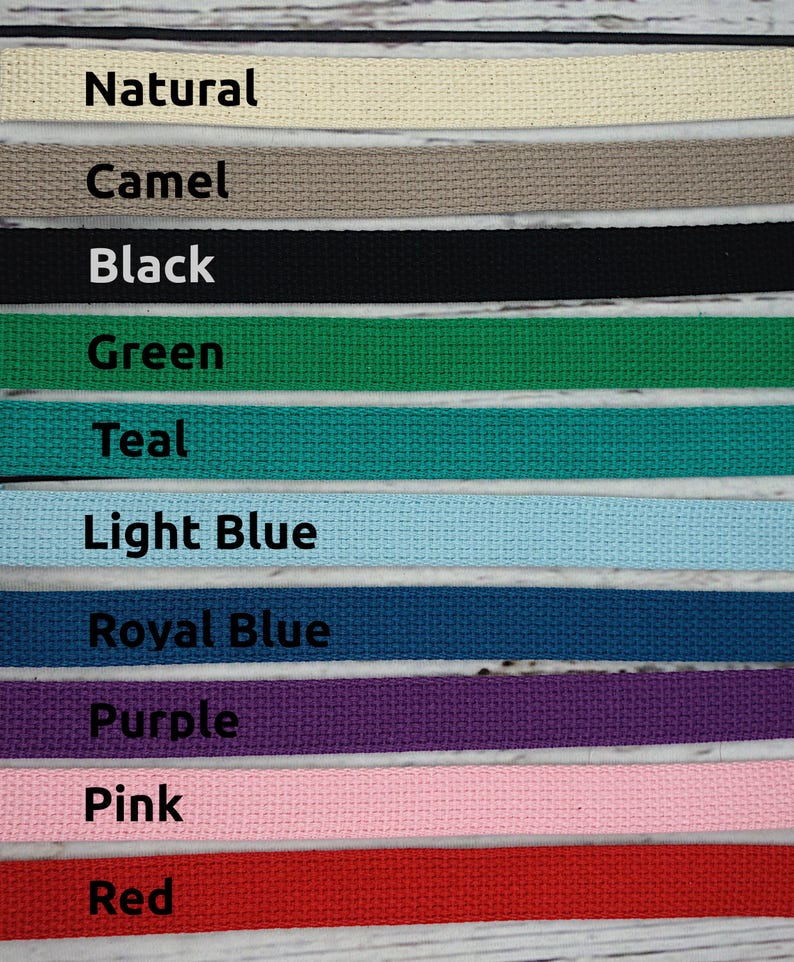 May include: A close-up of a selection of woven fabric straps in various colors. The colors include natural, camel, black, green, teal, light blue, royal blue, purple, pink, and red. Each strap has a label with its color name.