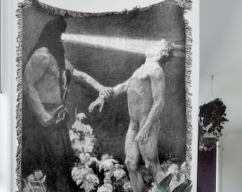 May include: Black and white woven tapestry featuring a dramatic scene of two figures. One figure is reaching out to the other, who is standing in a field of plants.
