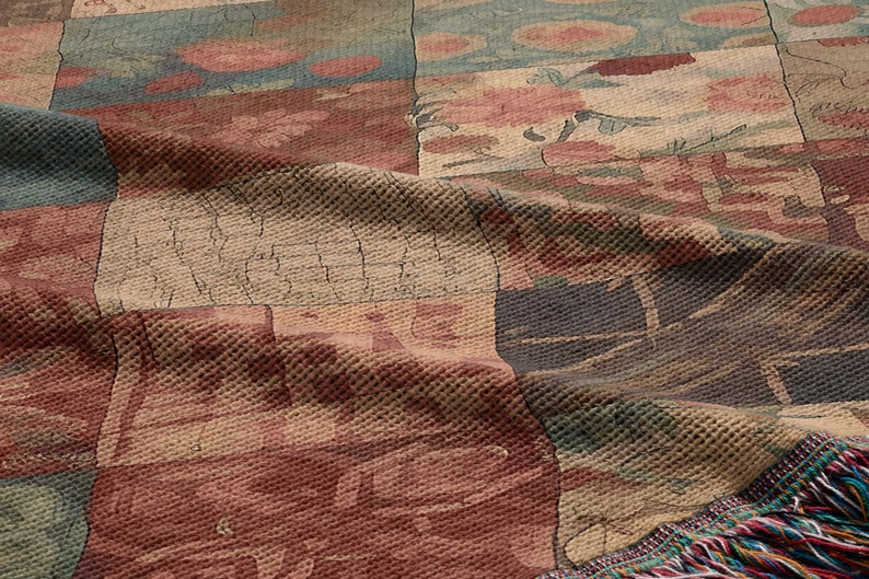 May include: A woven tapestry throw blanket with a patchwork design featuring various colours and patterns, including red, blue, green, and beige. The blanket has a fringed edge.