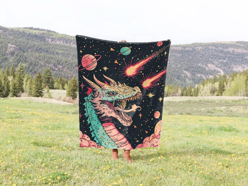 May include: A black tapestry with a colorful dragon head and shooting stars. The dragon has green, pink, and blue scales. The background is a dark blue with white stars.