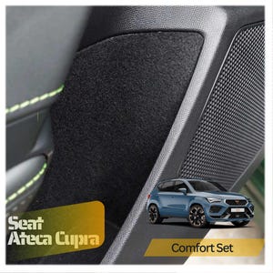 May include: Black car floor mats with a grey carpet surface and black trim. The mats are labelled "Seat Ateca Cupra Comfort Set".