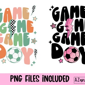 May include: Two digital designs with the words "GAME DAY" in a retro font, featuring a soccer ball and lightning bolts. One design is in pastel colors, the other in black and pink. The text "PNG FILES INCLUDED" is at the bottom.