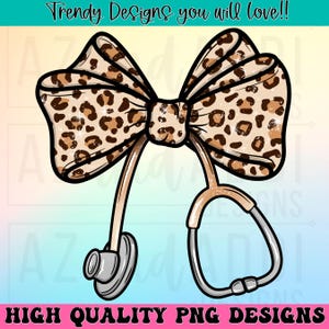 May include: A brown and gold leopard print bow with a stethoscope attached. The stethoscope has a gold colored tube and a black earpiece.