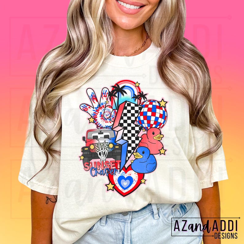May include: A white t-shirt with a colourful graphic design featuring a jeep, a peace sign, a lightning bolt, a heart, and rubber ducks. The text "Sunset Chapter" is included in the design.