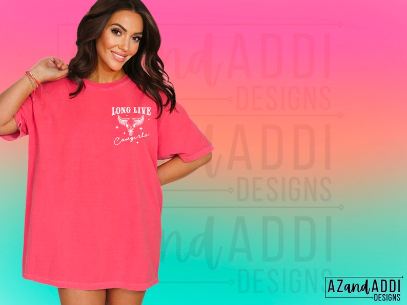 May include: An oversized pink t-shirt with a white graphic design that says "Long Live Cowgirls" with a stylised cow skull and stars.
