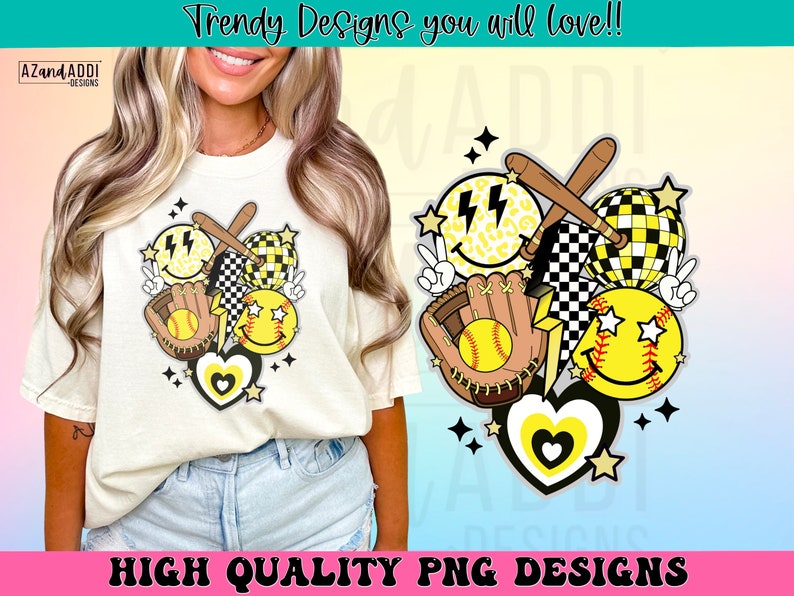 May include: Cream-colored t-shirt featuring a softball-themed graphic. The design includes yellow smiley faces, a baseball bat, a glove, and a softball. The text "Trendy Designs you will love!!" and "HIGH QUALITY PNG DESIGNS" are also visible.