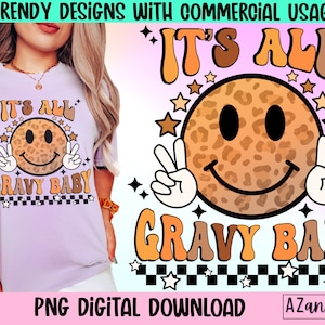 May include: A digital download of a graphic design featuring a smiling leopard print face with peace signs and the text "It's All Gravy Baby" in a retro 70s style font.