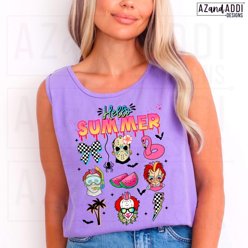 May include: A sleeveless lavender tank top with a colorful graphic that says "Hello Summer." The graphic includes a checkered bow, a Jason Voorhees mask, a pink flamingo, and other summer-themed illustrations.