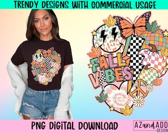 May include: A brown t-shirt with a colorful graphic design featuring a butterfly, lightning bolts, and the text "FALL VIBES". The design includes a peace sign, a checkered pattern, and fall leaves. The image also includes the text "PNG DIGITAL DOWNLOAD".