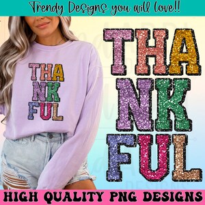 May include: A lilac sweatshirt featuring the word "THANKFUL" in a vibrant, glitter-effect design. The letters are in a collegiate font, each outlined in black. The image also includes the text "Trendy Designs you will love!!" and "HIGH QUALITY PNG DESIGNS".