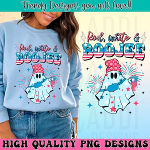 May include: A light blue sweatshirt with a ghost wearing a red, white, and blue bandana and holding a red, white, and blue drink. The text "Red, white & BOOJEE" is in red, white, and blue letters with a red, white, and blue striped background.