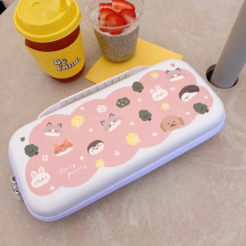 May include: White pencil case with a pink cloud design featuring cartoon animals like cats, a bunny, and a dog. The case has a zipper closure and a handle. The text "Starry Forever" is also visible on the case.