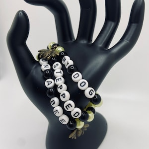 My Dog Stepped on a Bee Johnny Depp Trial Black and Yellow Beaded Bracelet with Two Gold Bee Charms