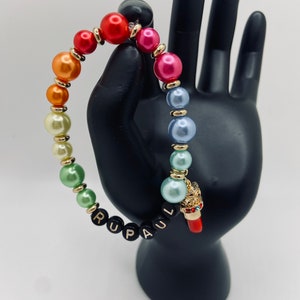 RuPaul’s Drag Race Rainbow Beaded Bracelet with Gold Lipstick Charm