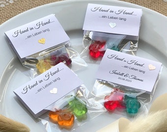 Gastgeschenk zur Hochzeit: Hand in Hand ein Leben lang – Schön, dass du da bist. Bärchen-Pärchen,Gummi-Bärchen personalisiert,WEISS 10er Set