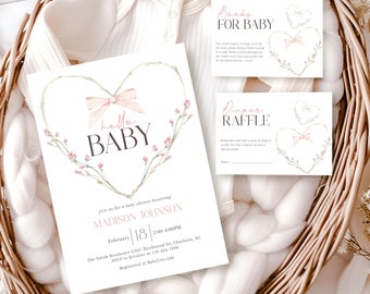 May include: A pink and green floral heart-shaped design with the text "hello baby" on a white background. The invitation includes the text "join us for a baby shower honoring Madison Johnson, February 18, 2:00-4:00PM, The Smith Residence 1637 Birchwood Dr. Charlotte, NC, RSVP to Kristine at 123-426-7890, Registered at BabyList.com".