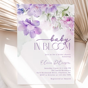 May include: A purple and white floral bridal shower invitation with the text "baby in bloom" and the name "Olivia Peterson". The invitation includes the date, time, location, and RSVP information. The invitation also states that the event is registered at Amazon.