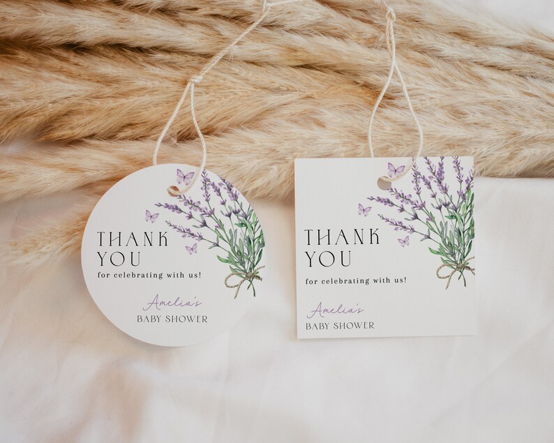 May include: Two round thank you tags with lavender and butterflies. The text reads "Thank You for celebrating with us! Amelia's Baby Shower".