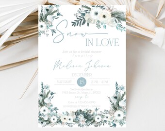 May include: A bridal shower invitation with the words "Snow in Love" in a soft blue script. The invitation features floral arrangements in white and teal, with the date December 15th. The invitation is for Madison Johnson.