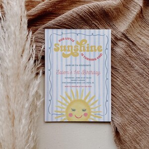 May include: A birthday invitation with a blue and white striped background. The text "Our Little Sunshine is turning one!" is in yellow. A smiling sun graphic is at the bottom. The invitation is for Salem's 1st Birthday.