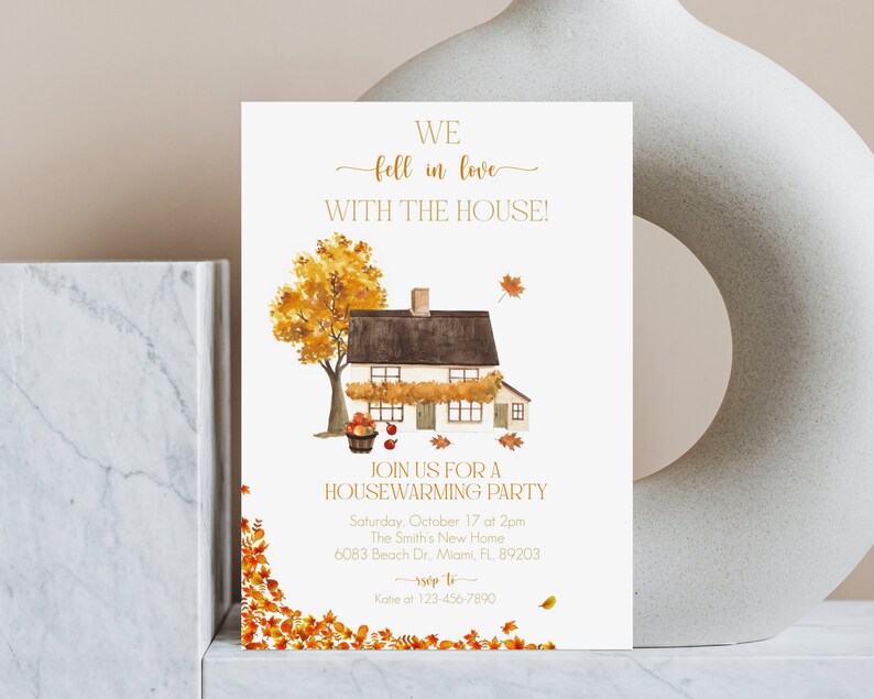 May include: A housewarming party invitation with a watercolor illustration of a house, tree, and fall leaves. The text reads "We fell in love with the house!" and "Join us for a housewarming party."