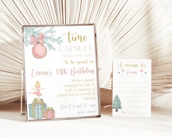 May include: A framed time capsule sign with text for Emma's 18th birthday, featuring a pink ornament, ballerina, and gifts. A matching card reads "A message for Emma" with a Christmas tree illustration.