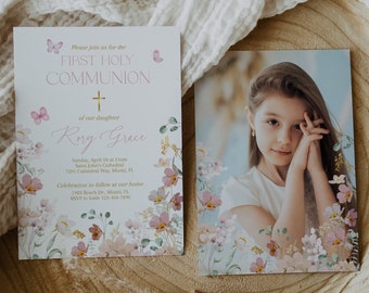May include: A white card with pink and gold floral accents and butterflies. The card is an invitation to a First Holy Communion for Rory Grace. The invitation includes the date, time, and location of the ceremony and reception. A photo of a young girl in a white dress is on the right side of the card.