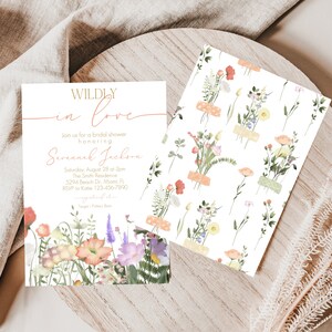 May include: A bridal shower invitation with a floral design. The invitation reads "Wildly in Love" and includes the name "Savannah Jackson". The invitation is for a bridal shower on August 28th at 2pm at The Smith Residence, 5294 Beach Dr., Miami, FL. RSVP to Katie at 123-456-7890.