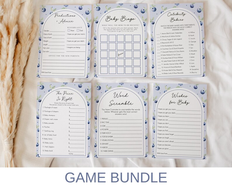 May include: A set of printable baby shower game cards with a blue and white blueberry theme. The cards include games like "Predictions & Advice", "Baby Bingo", "Celebrity Babies", "The Price is Right", "Word Scramble", and "Wishes for Baby".