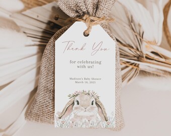 May include: Thank you for celebrating with us!  Madison's Baby Shower March 18, 2025.  A white tag with pink script text and a watercolor illustration of a bunny wearing a flower crown.